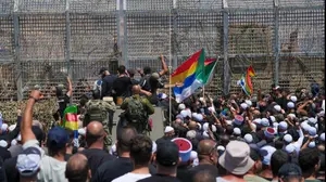דרוזים סמוך לגדר גבול בין סוריה לישראל, 16 ביולי 2025